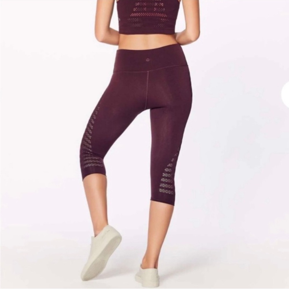 Lululemon Athletica Burgundy Capris with cut ours size 6